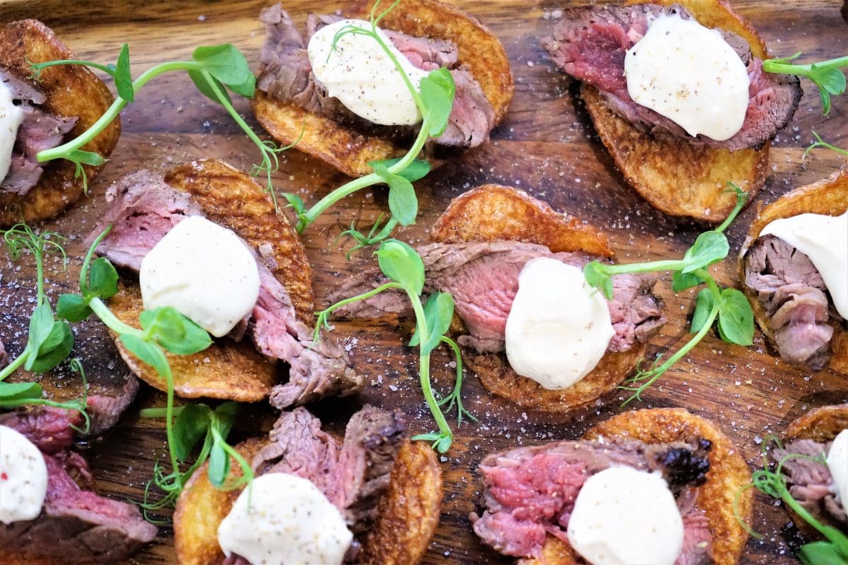 Rare beef on a twice baked kettle chip with horseradish cream