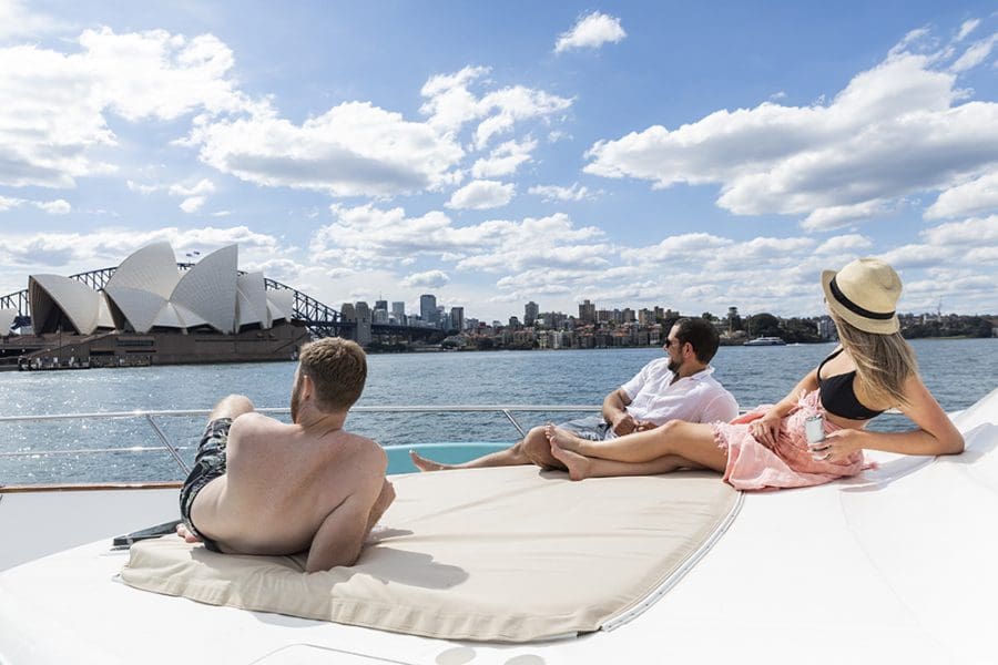 Lifestyle Charters Enigma relaxing on the bow sunbed Privacy Boat Sydney